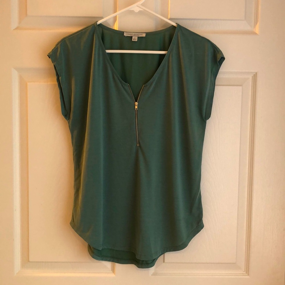 Green Envelope short sleeved blouse. Size S. Half zip. Lightweight.